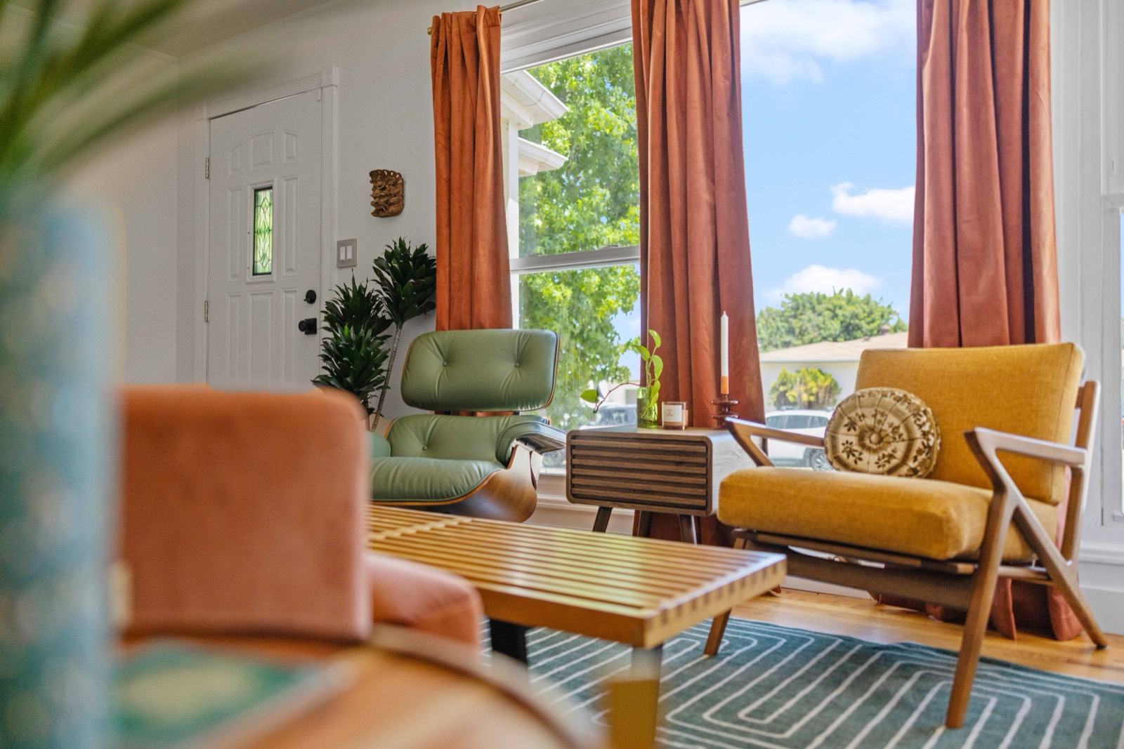 Midcentury seating by the entry