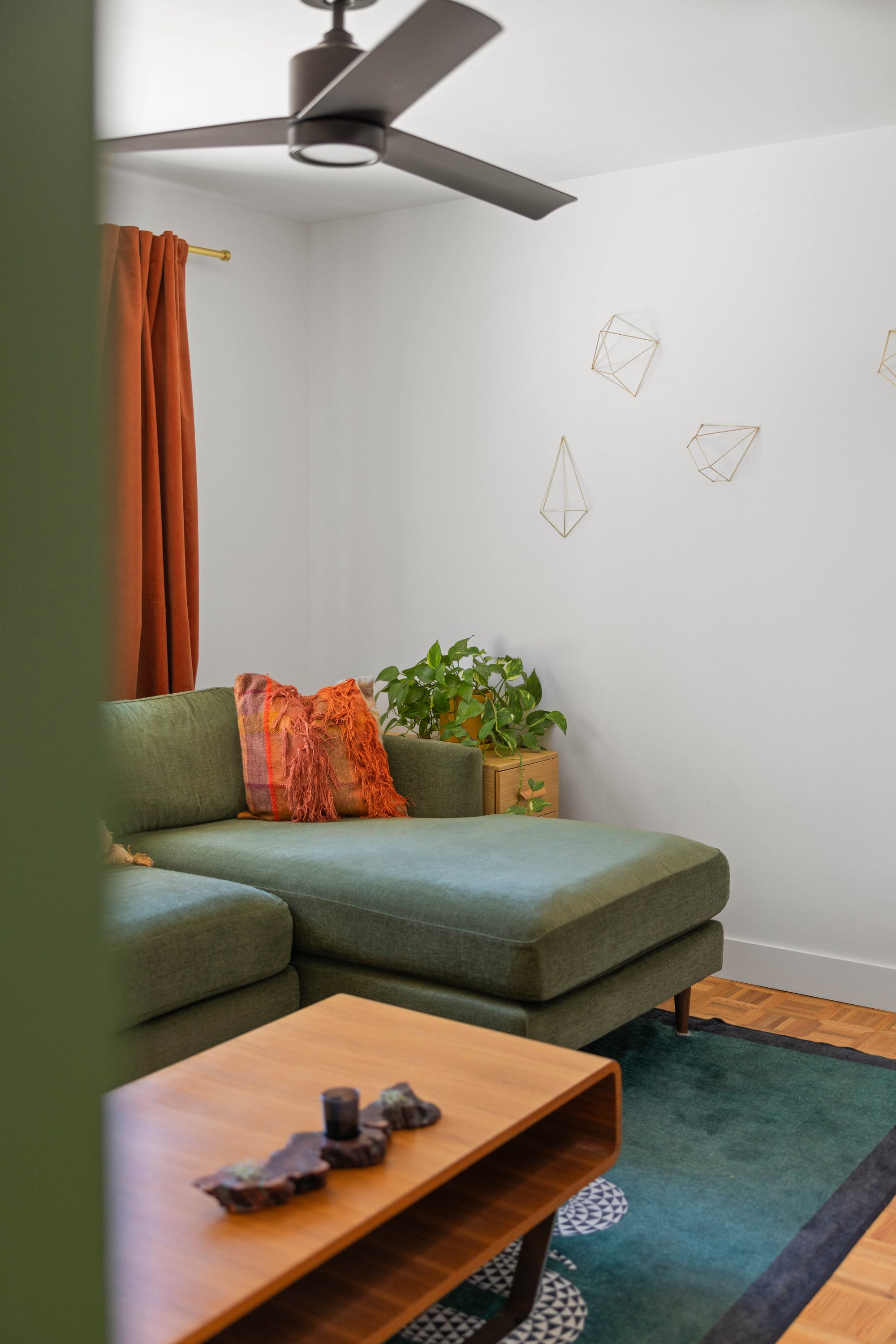 The den with the green sectional